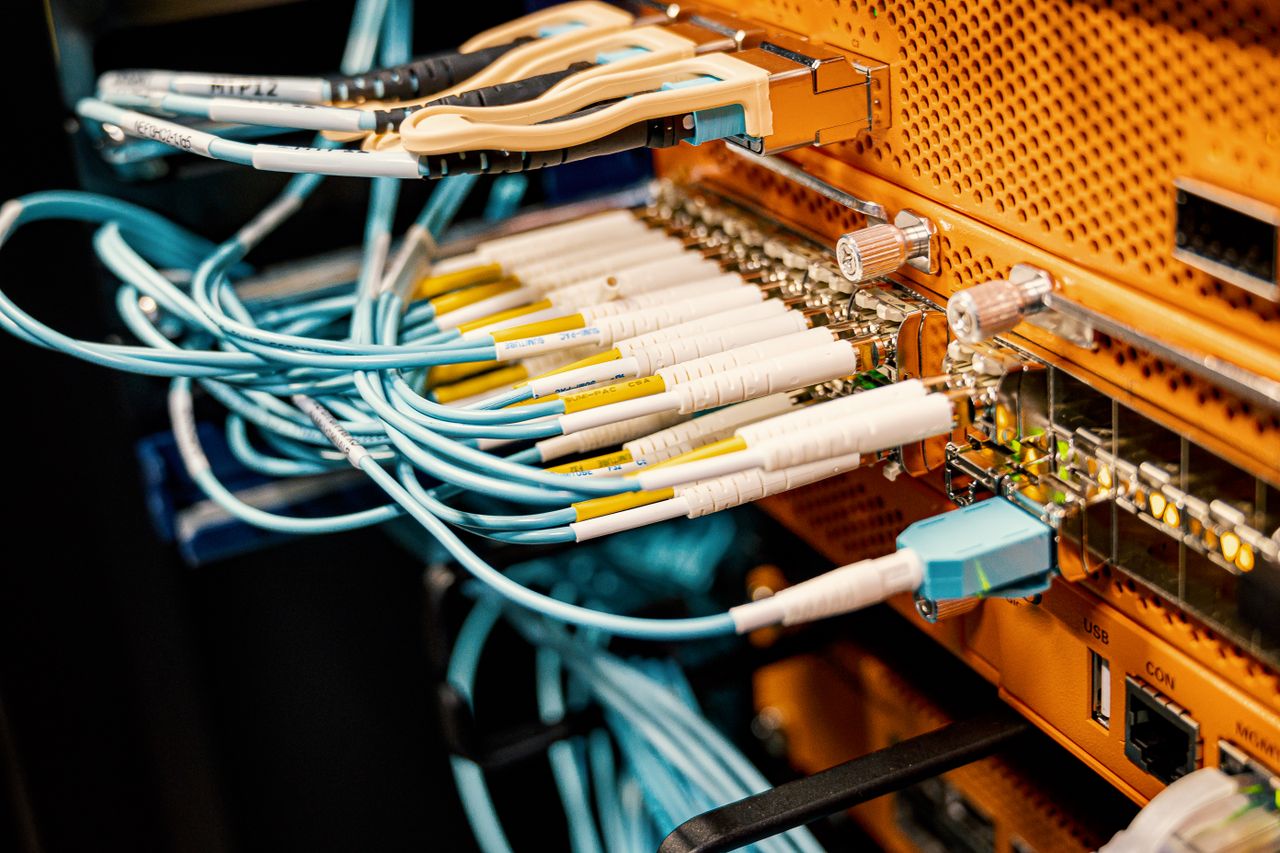 About Modern hardware and structured cabling system with patch cords inserted into patch panel outlets